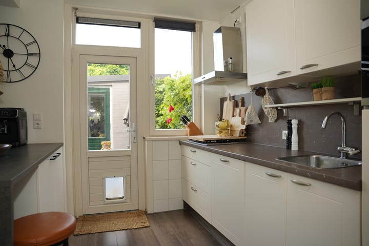 Foto 10 van Damstraat 4