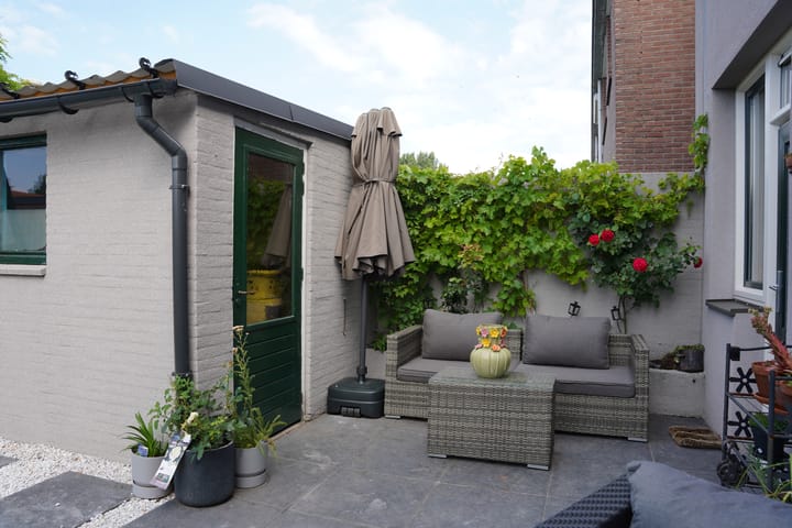 Foto 26 van Damstraat 4