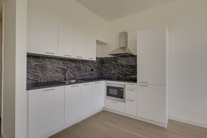 Foto 11 van Herensingel 2-B1