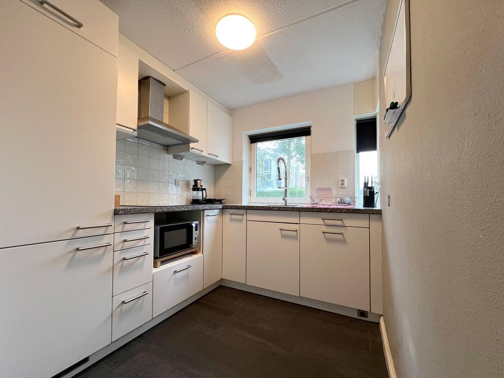 Foto 12 van Makelaar 25