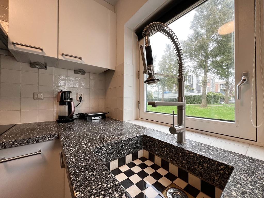 Foto 14 van Makelaar 25