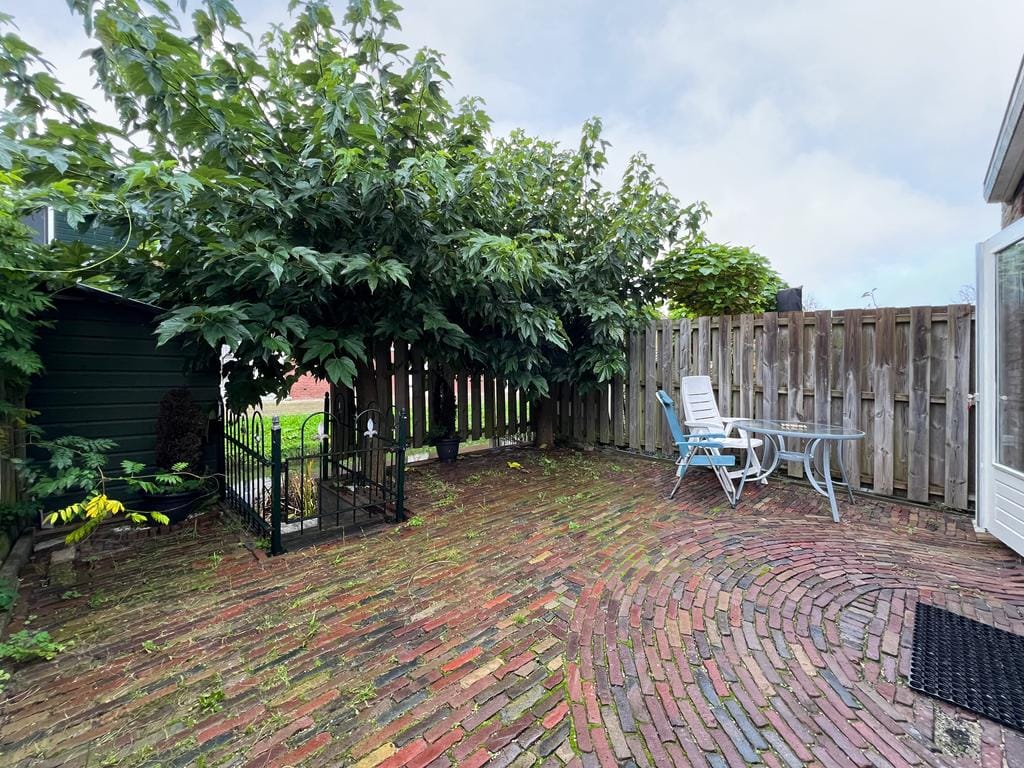 Foto 21 van Makelaar 25