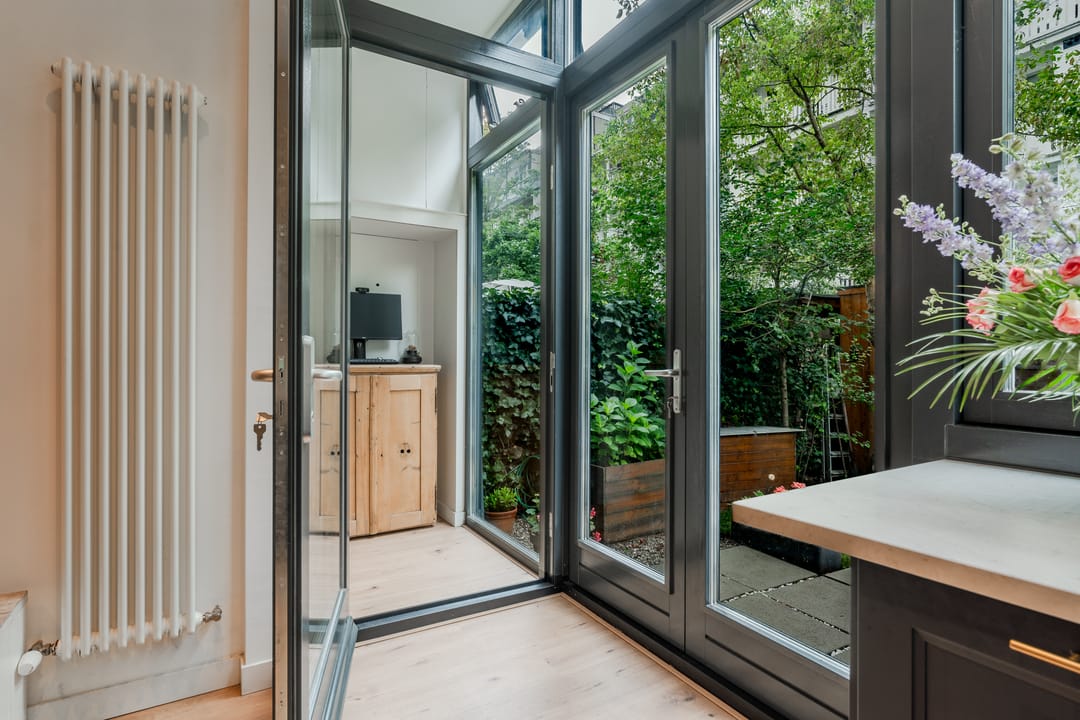 Foto 26 van Brederodestraat 38-H