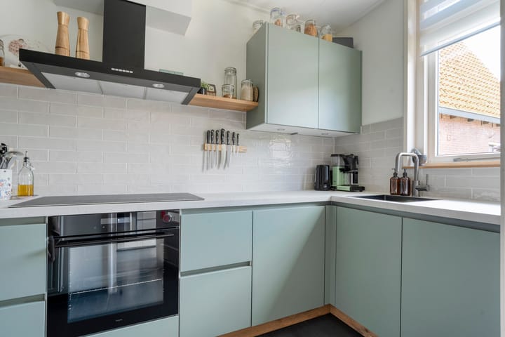 Foto 16 van Henric de Cranestraat 6