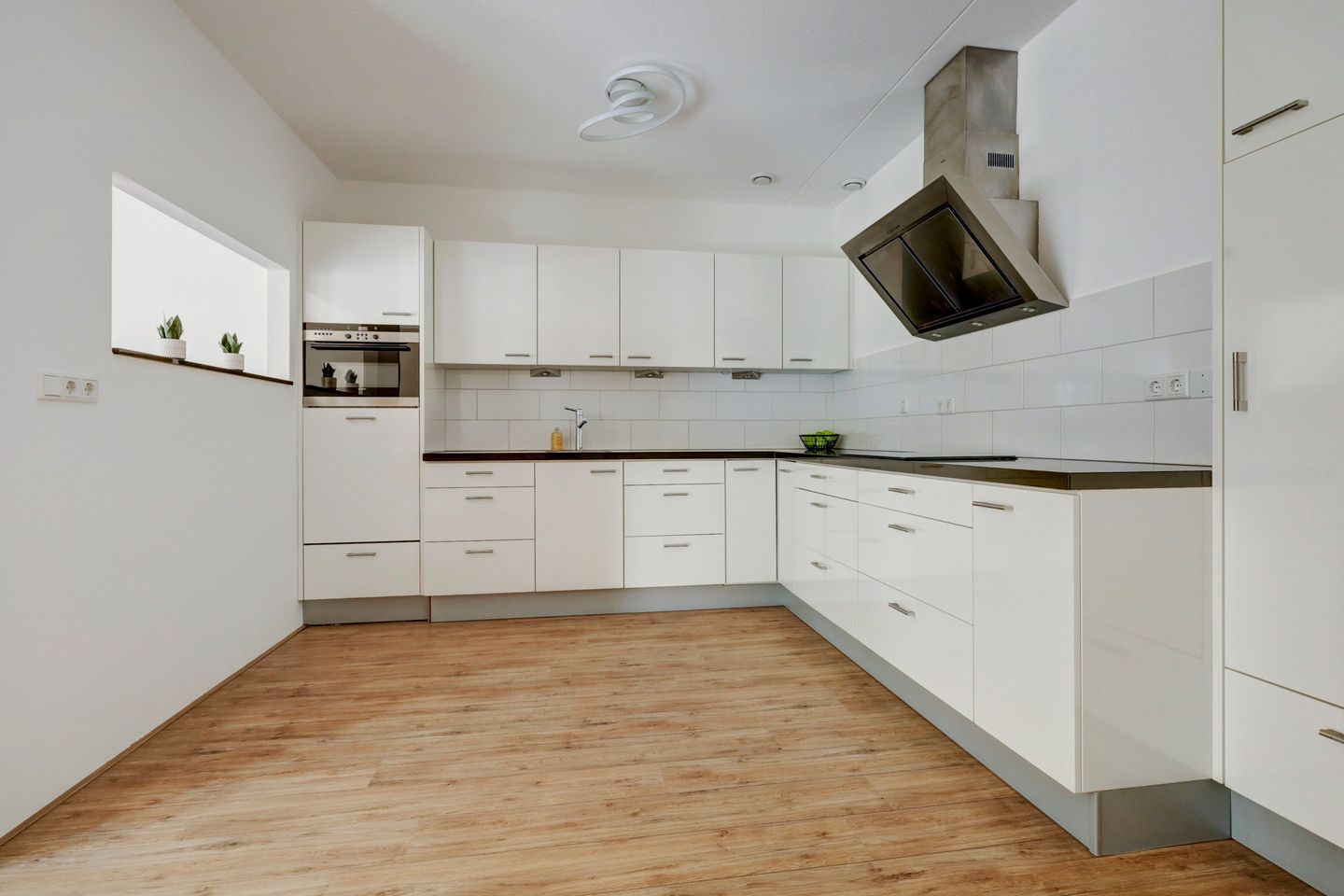 Foto 14 van Rector van den Broekstraat 1-B008