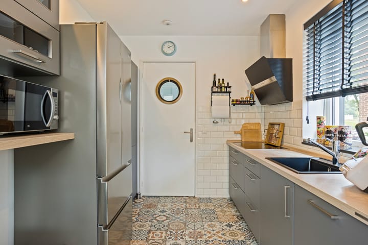 Foto 15 van Vroenstraat 70