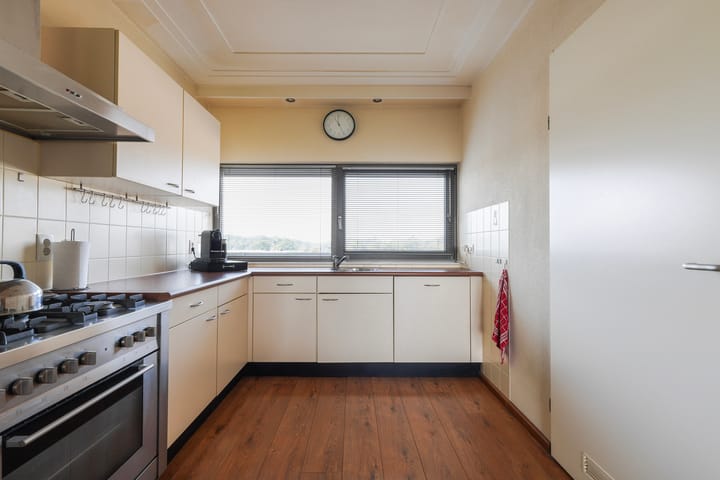 Foto 29 van Banier 72