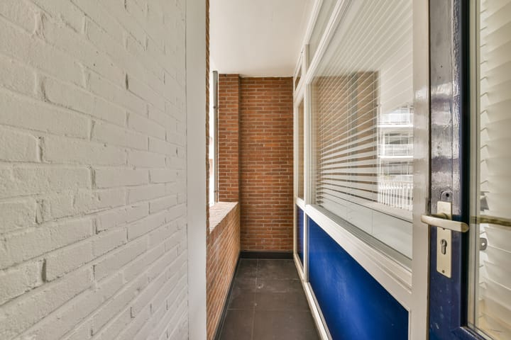 Foto 16 van Jodenbreestraat 112