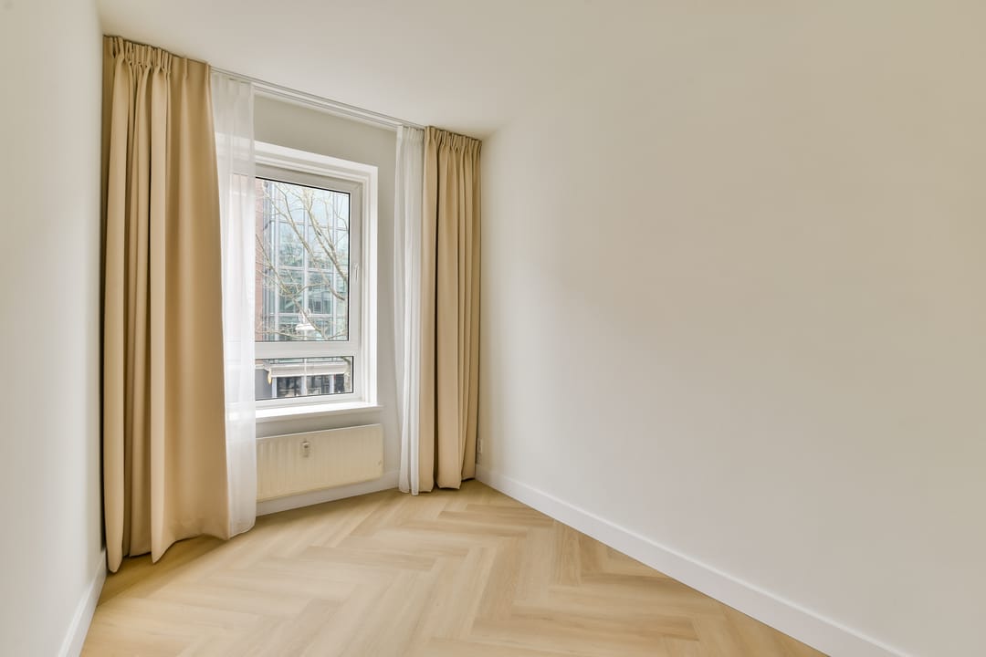 Foto 28 van Jodenbreestraat 112