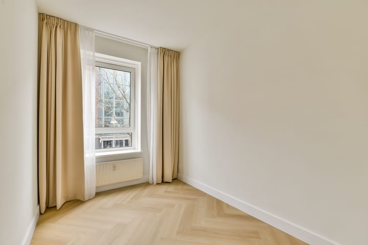 Foto 28 van Jodenbreestraat 112