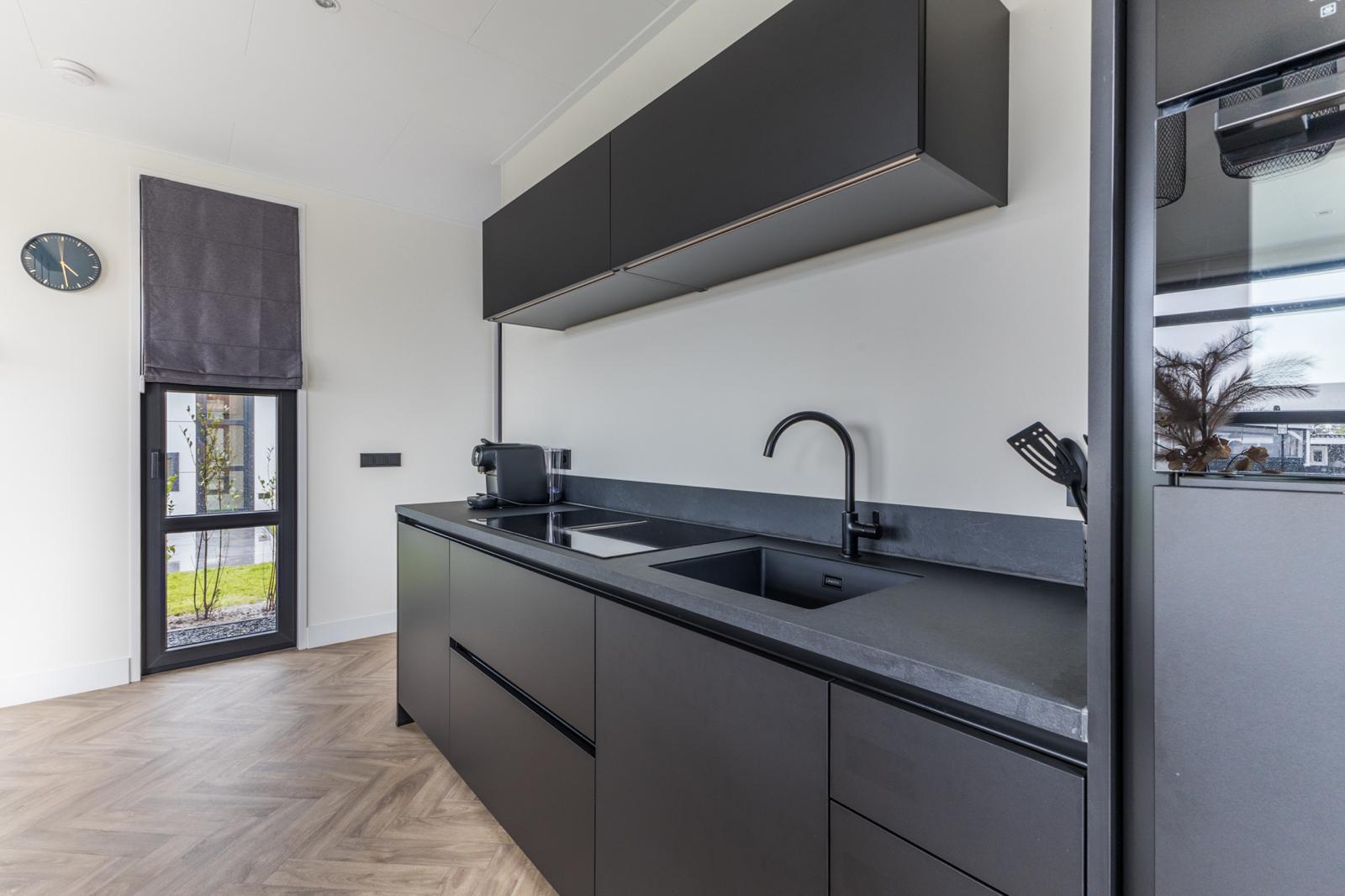 Foto 18 van Nieuw-Loosdrechtsedijk 215-CH011