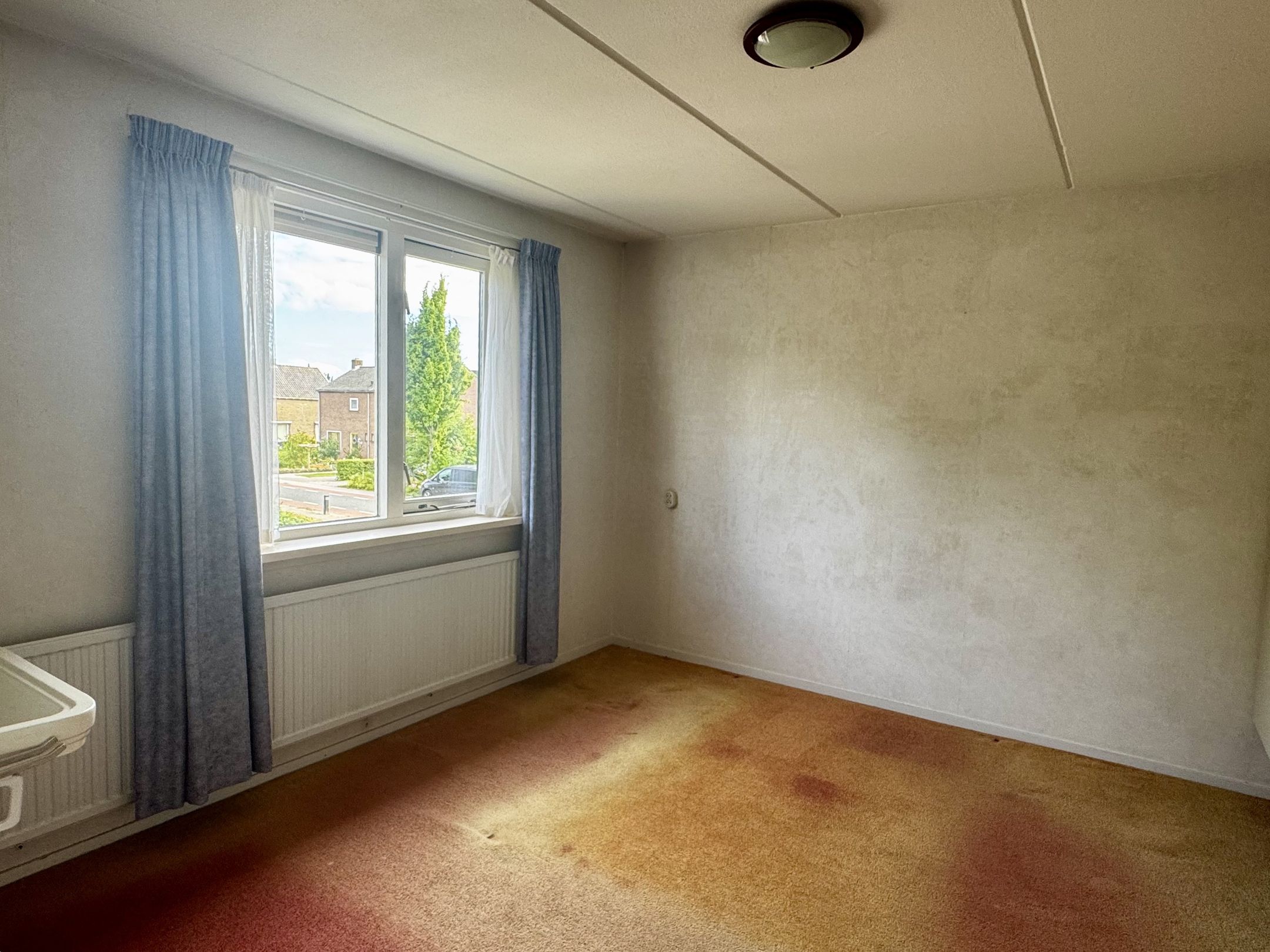 Foto 12 van Raadhuisstraat 34