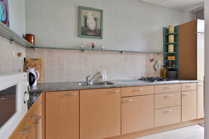 Foto 12 van Weegbree 52