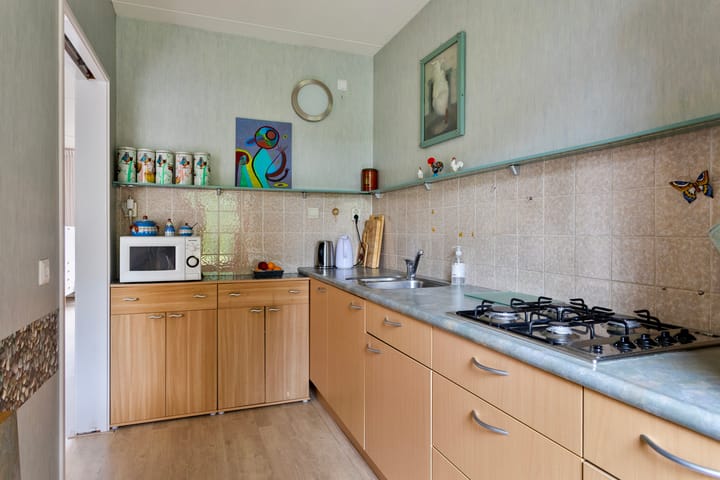 Foto 13 van Weegbree 52