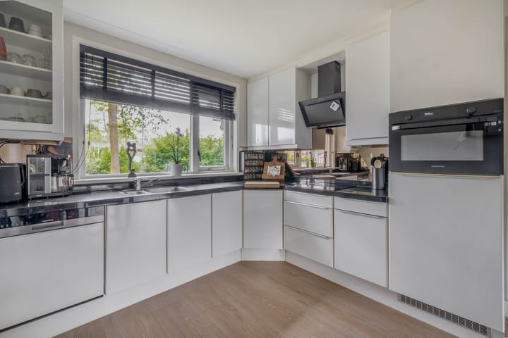 Foto 10 van Hermelijnweide 18