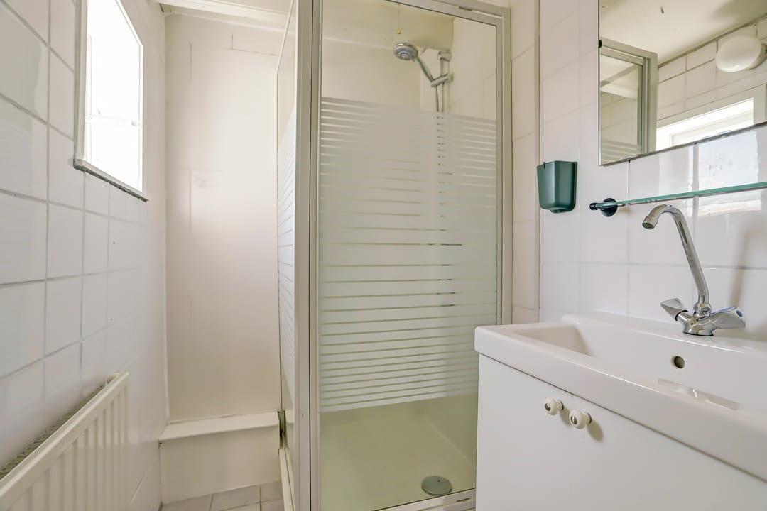 Foto 17 van Schuttershofstraat 7