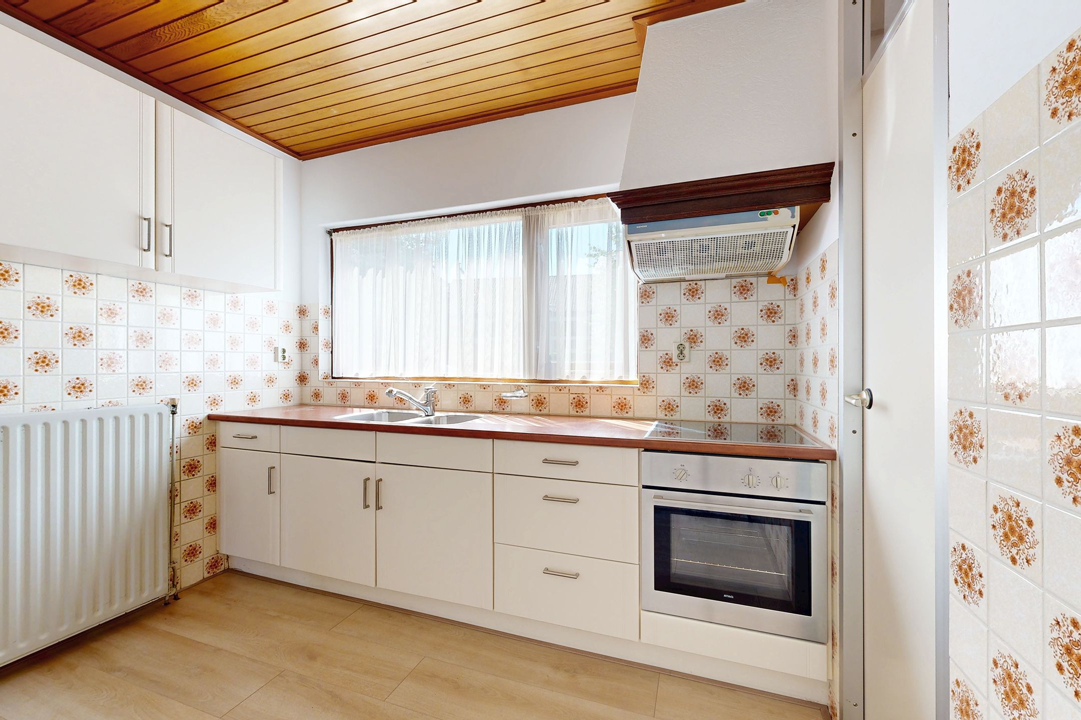 Foto 24 van Raadhuisstraat 18