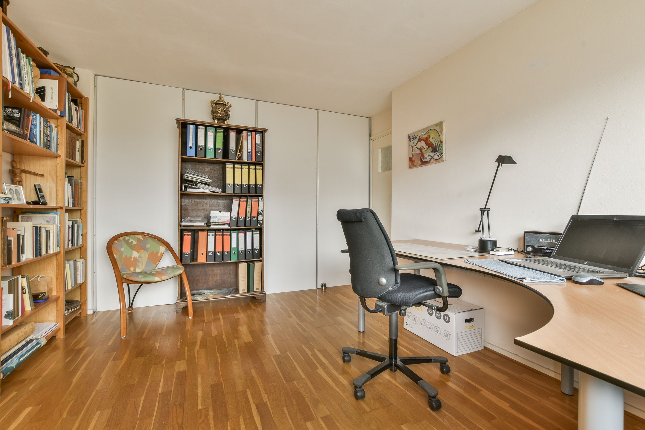 Foto 21 van van den Woudestraat 28