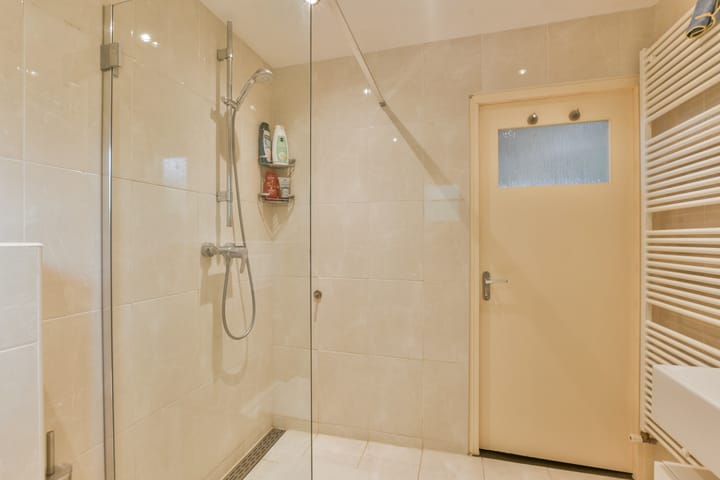 Foto 23 van van den Woudestraat 28