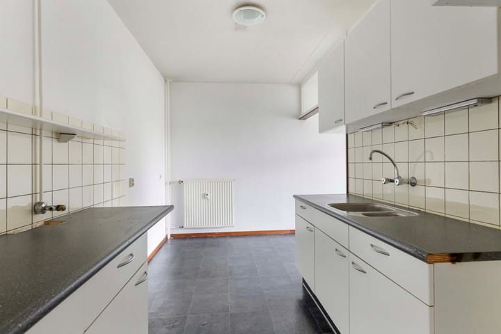 Foto 12 van Heutinkstraat 1