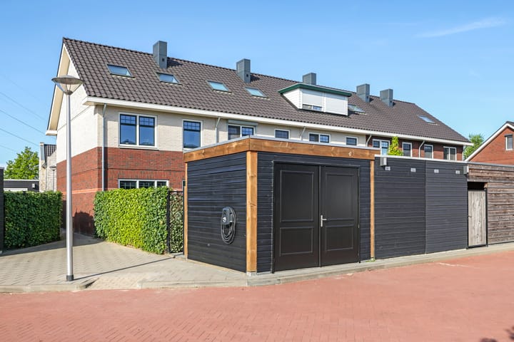 Foto 62 van Weegbree 61