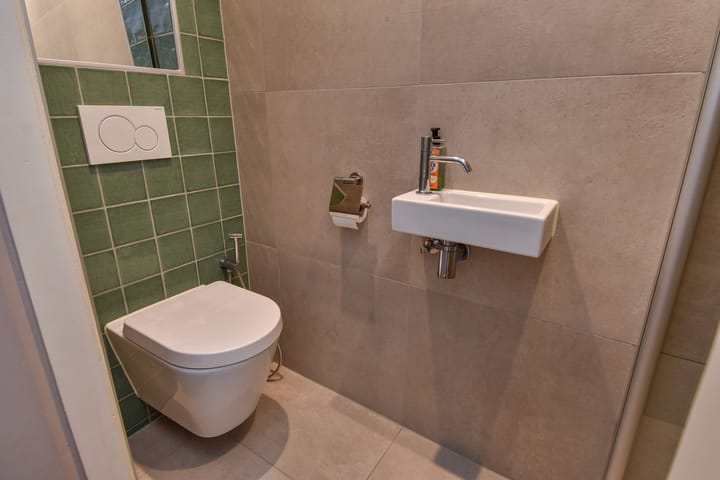 Foto 14 van Warmoezierstraat 10