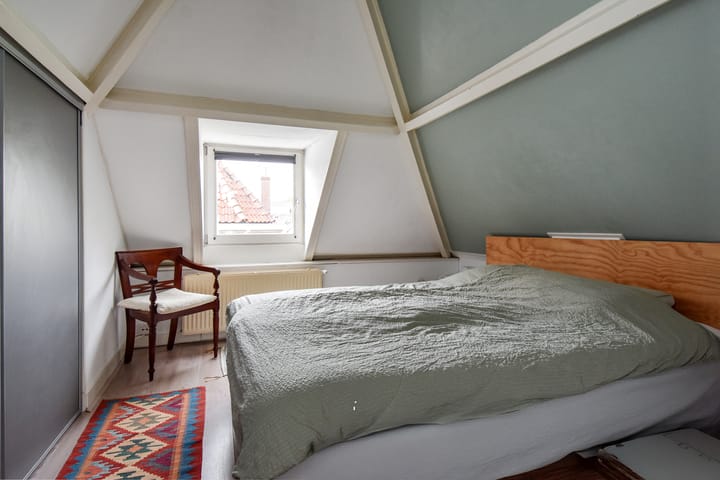 Foto 25 van Warmoezierstraat 10