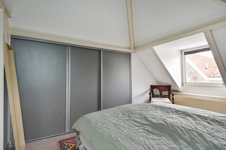 Foto 26 van Warmoezierstraat 10