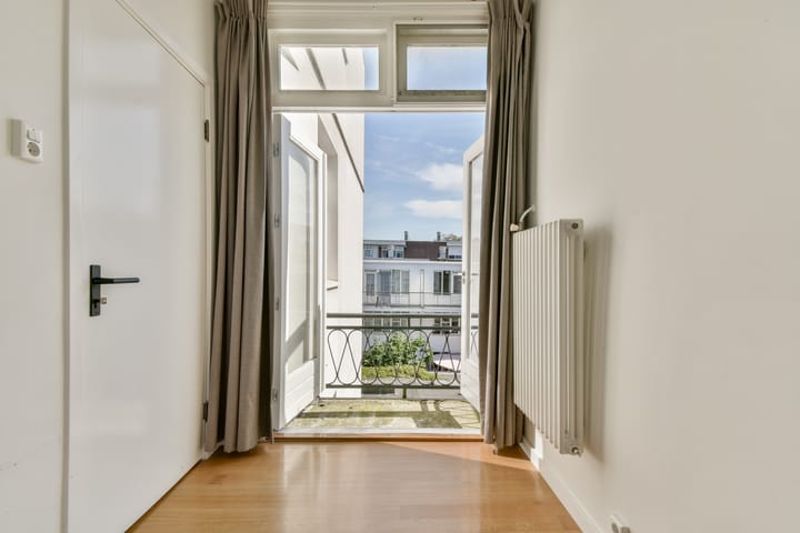 Foto 29 van Haarlemmerdijk 134