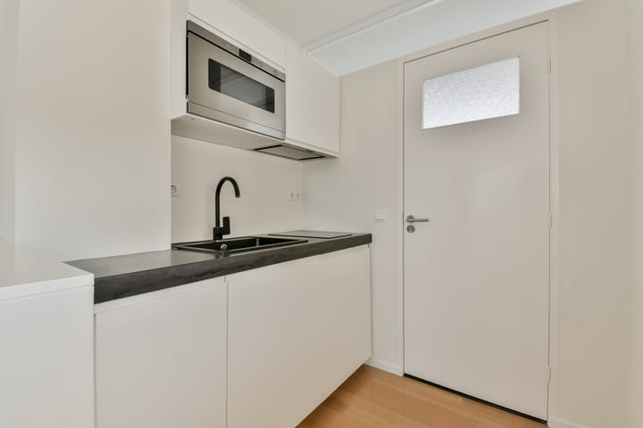 Foto 38 van Haarlemmerdijk 134