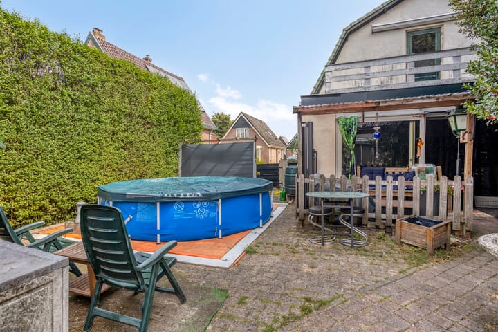 Foto 14 van Tienwoningenweg 8