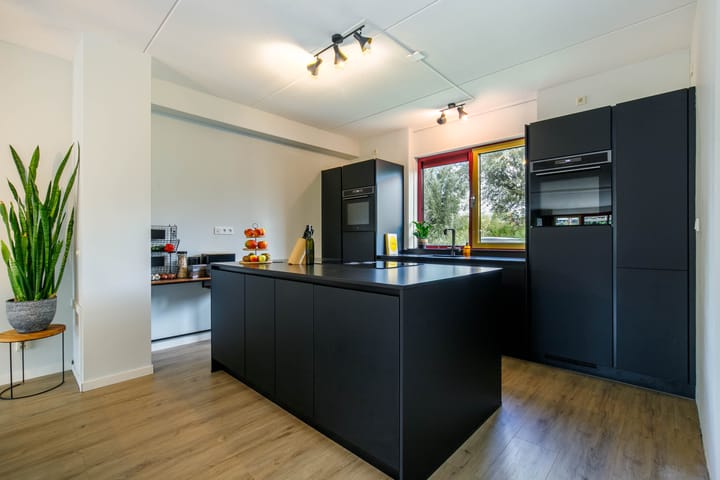 Foto 15 van Vrouwenmantel 73