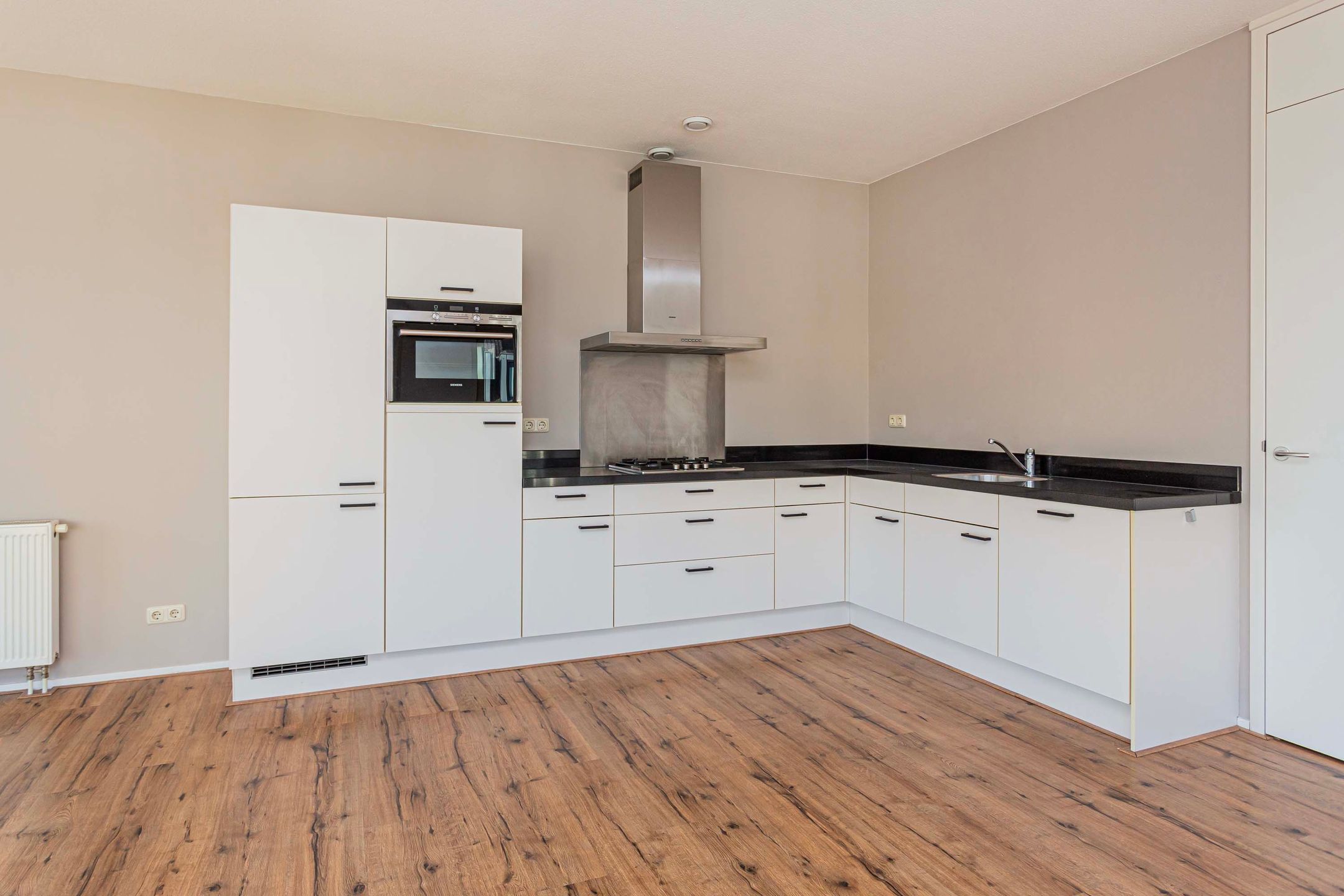 Foto 12 van J. Homan van der Heideplein 8