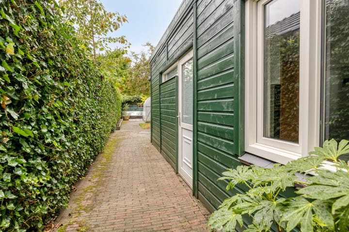 Foto 33 van Houtstraat 73