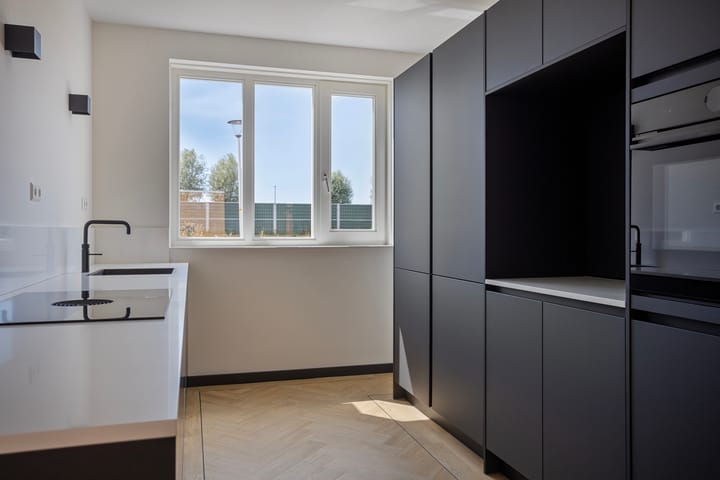 Foto 11 van John Kraaijkampstraat 12