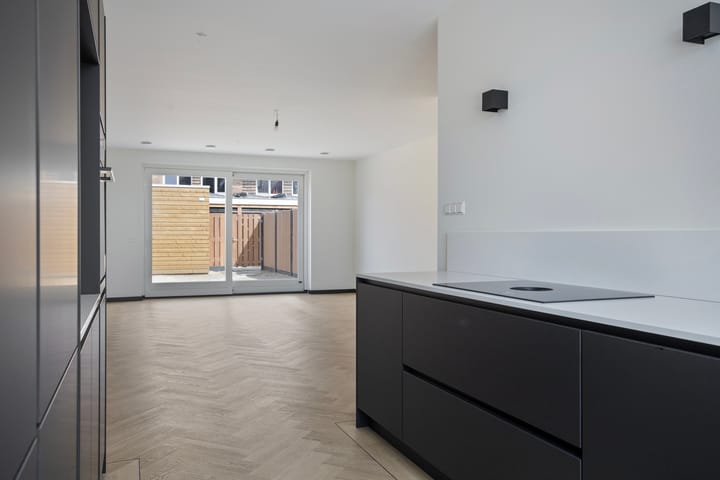 Foto 12 van John Kraaijkampstraat 12