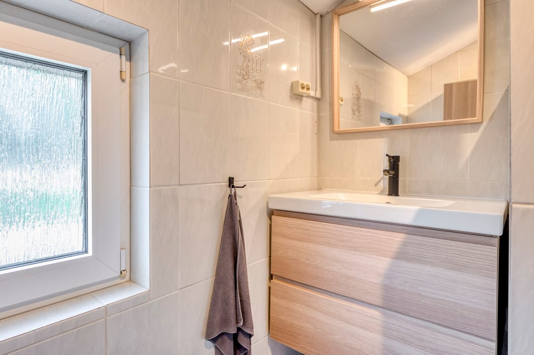 Foto 31 van Broeksittarderweg 128