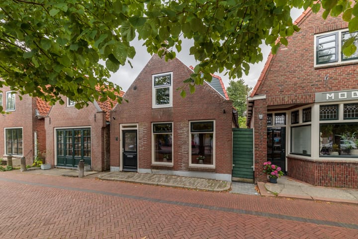 Foto 28 van Raadhuisstraat 59