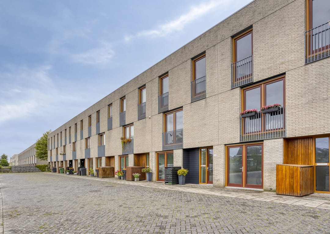 Foto 1 van Weegbree 25