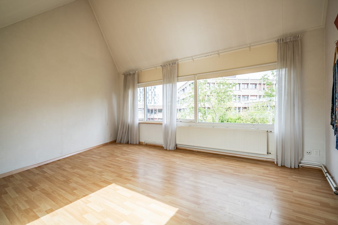 Foto 31 van Van Ravelingenstraat 12