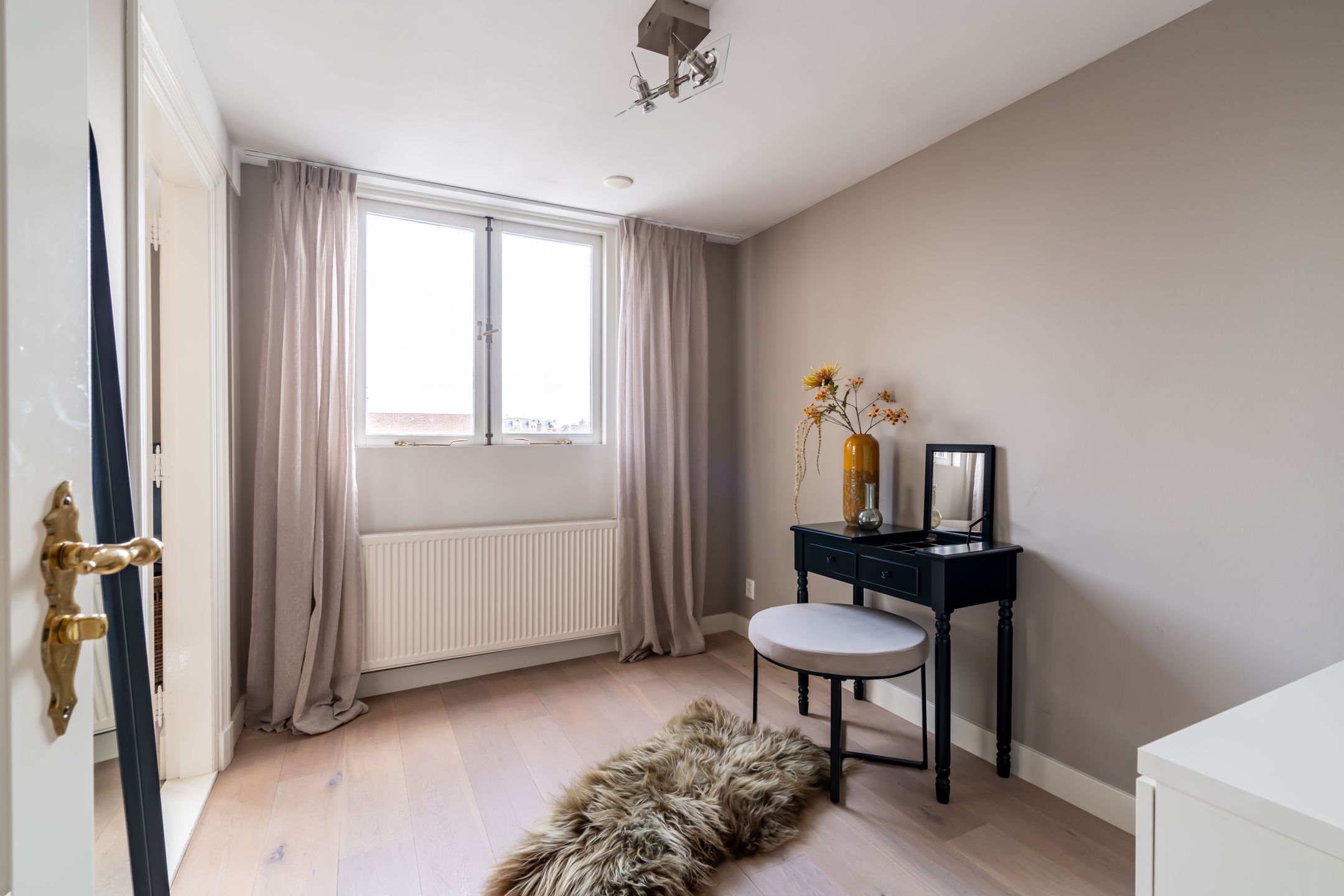 Foto 18 van Denneweg 13-B