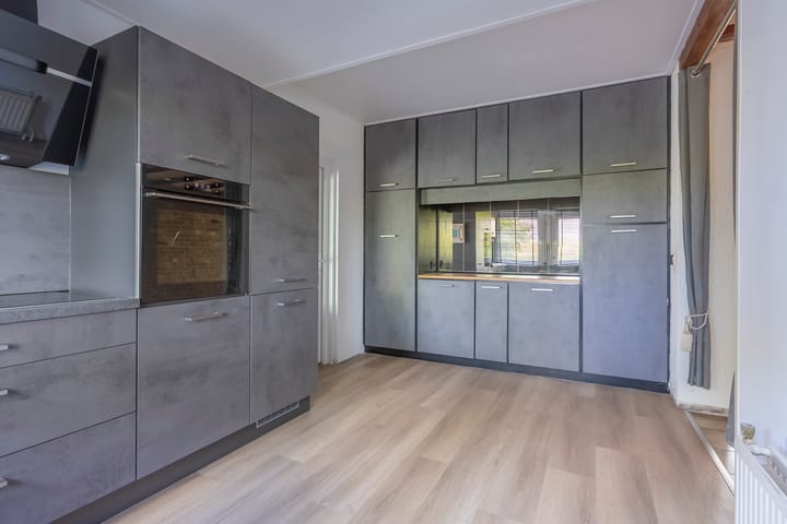 Foto 11 van Raadhuisstraat 34