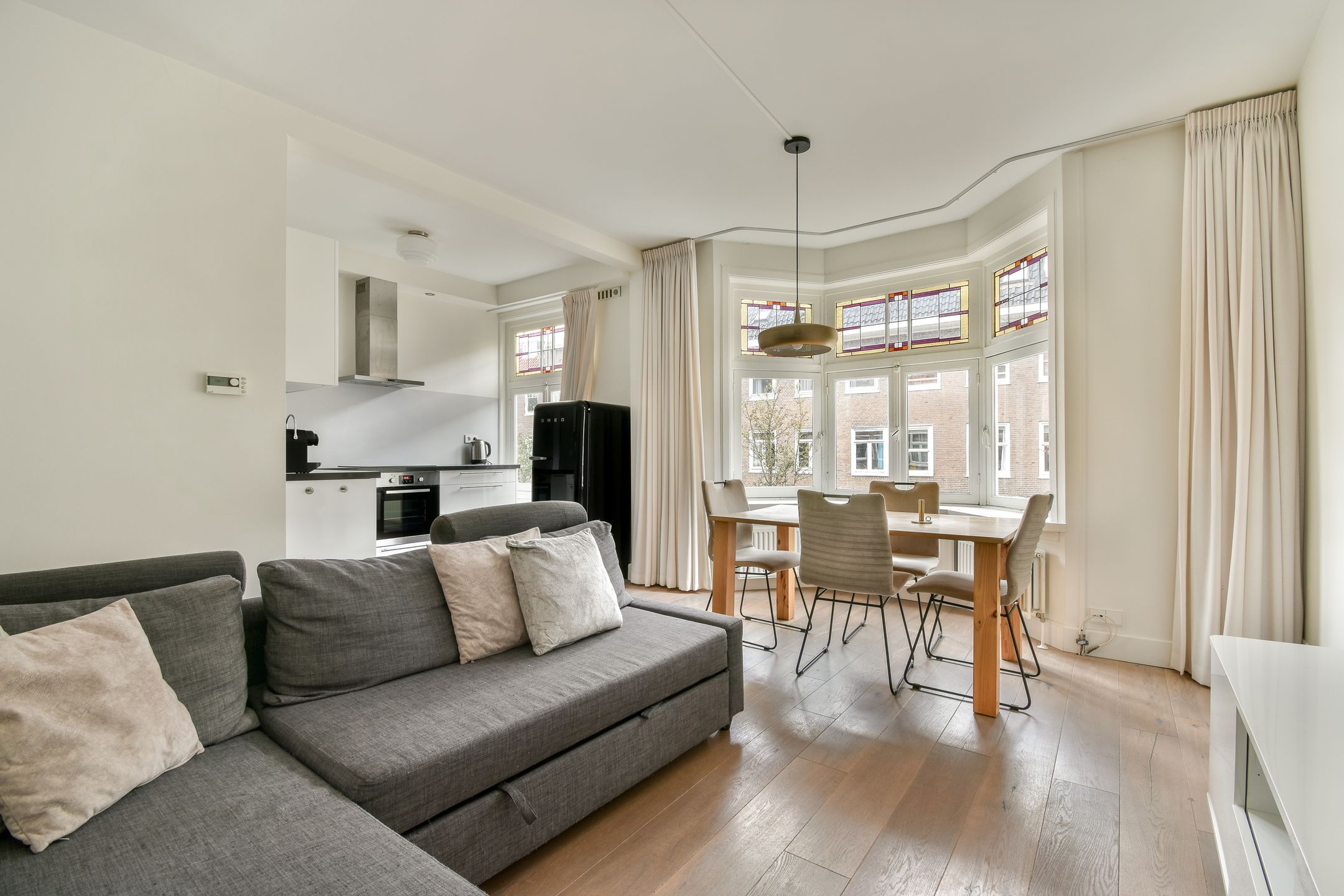 Foto 3 van Woubruggestraat 35-1