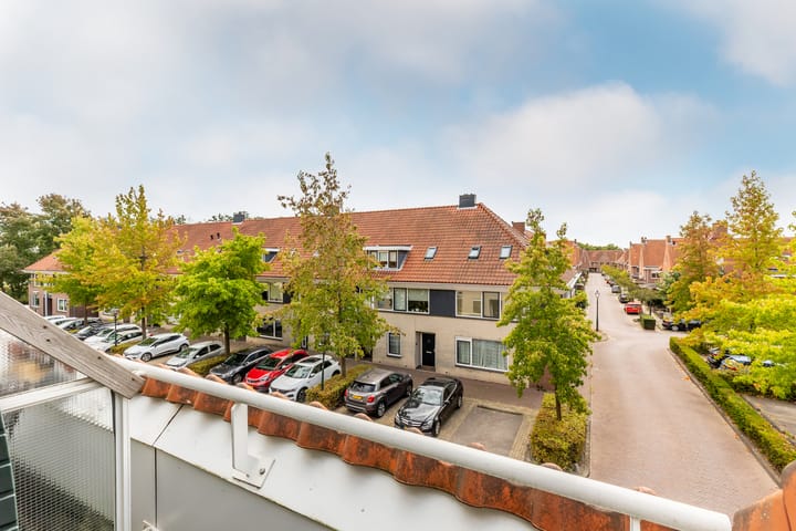 Foto 26 van Warmoezenierstraat 6