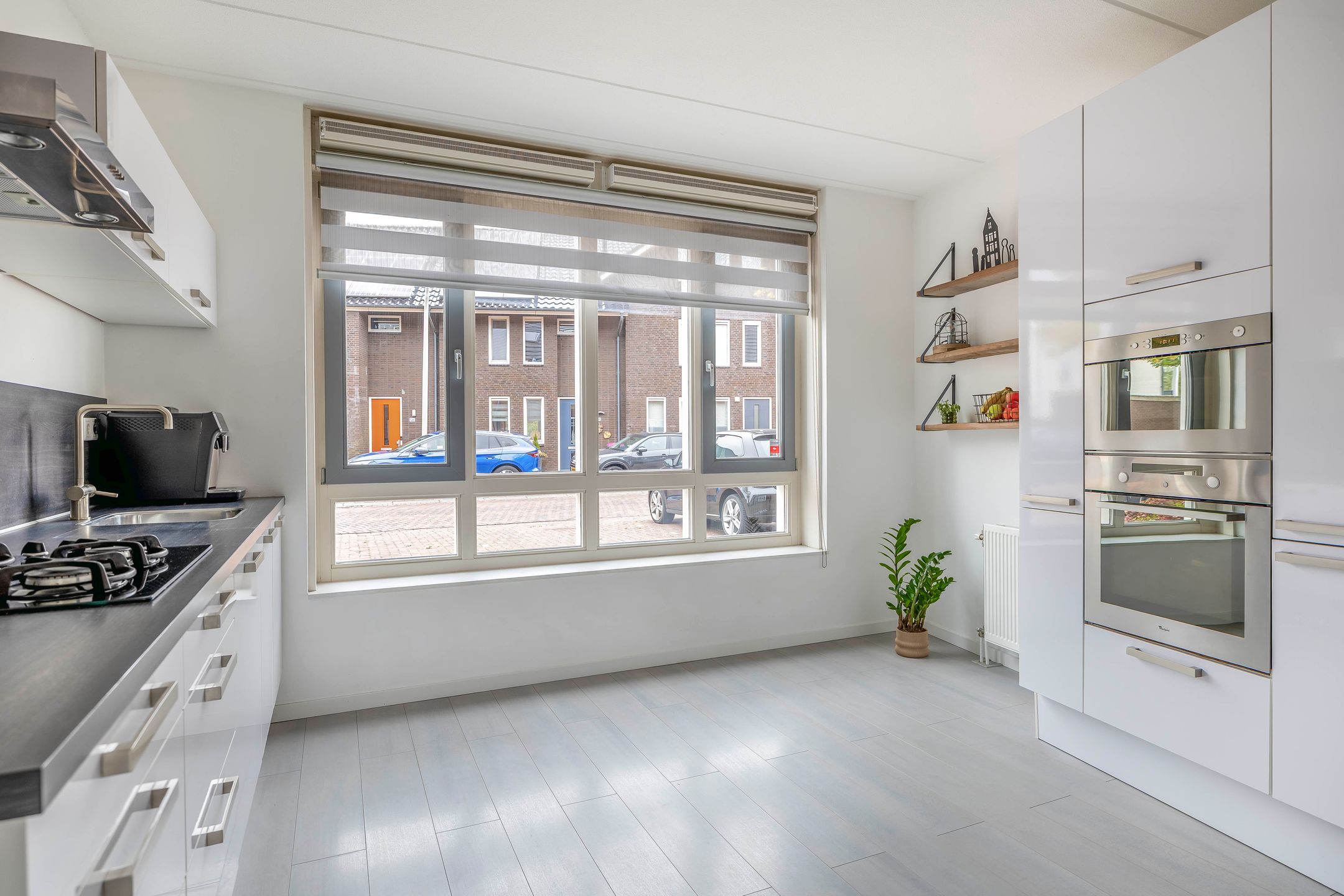 Foto 9 van Weegbree 125