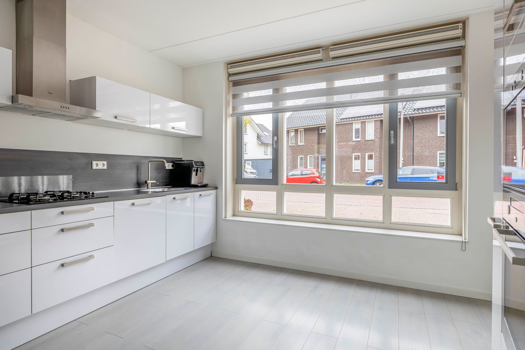 Foto 12 van Weegbree 125