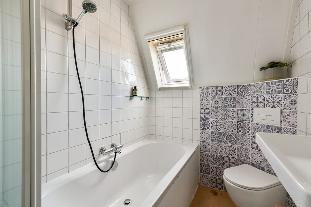 Foto 16 van Woudstraat 68