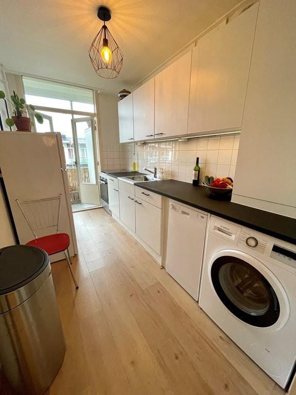 Foto 9 van Hoofdweg 154-3