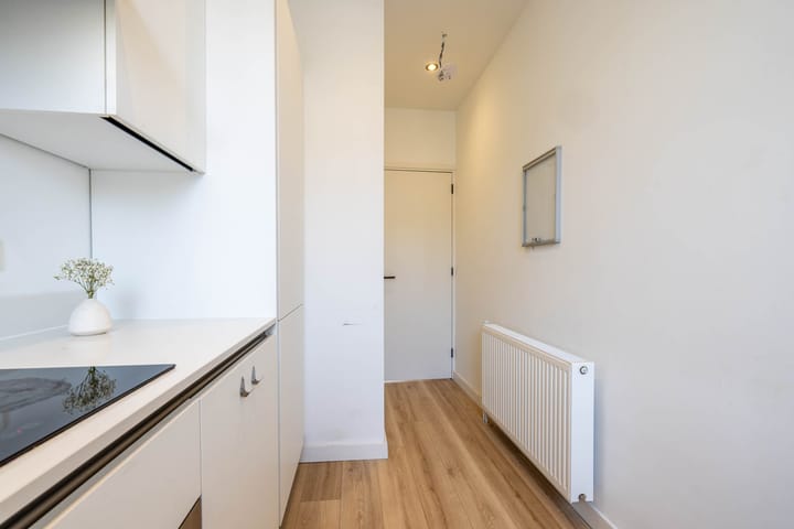 Foto 12 van Tamboerstraat 15-A02