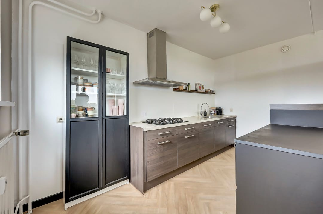 Photo 13 of Heutinkstraat 145